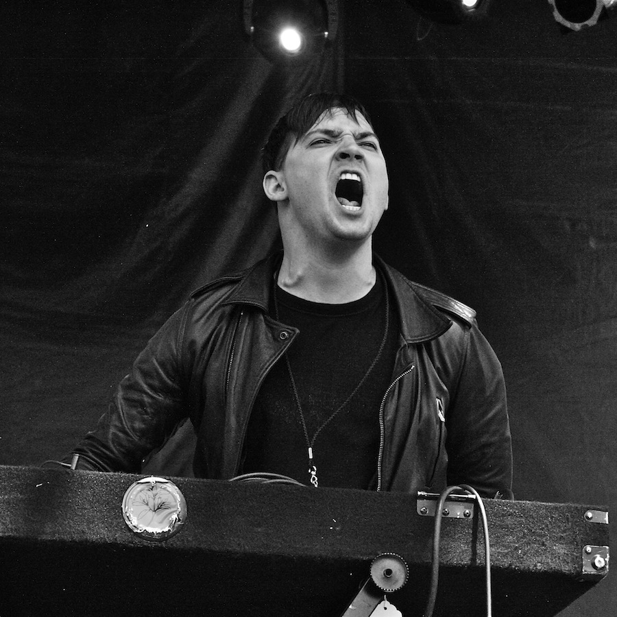 Dominick Fernow performing with Cold Cave 