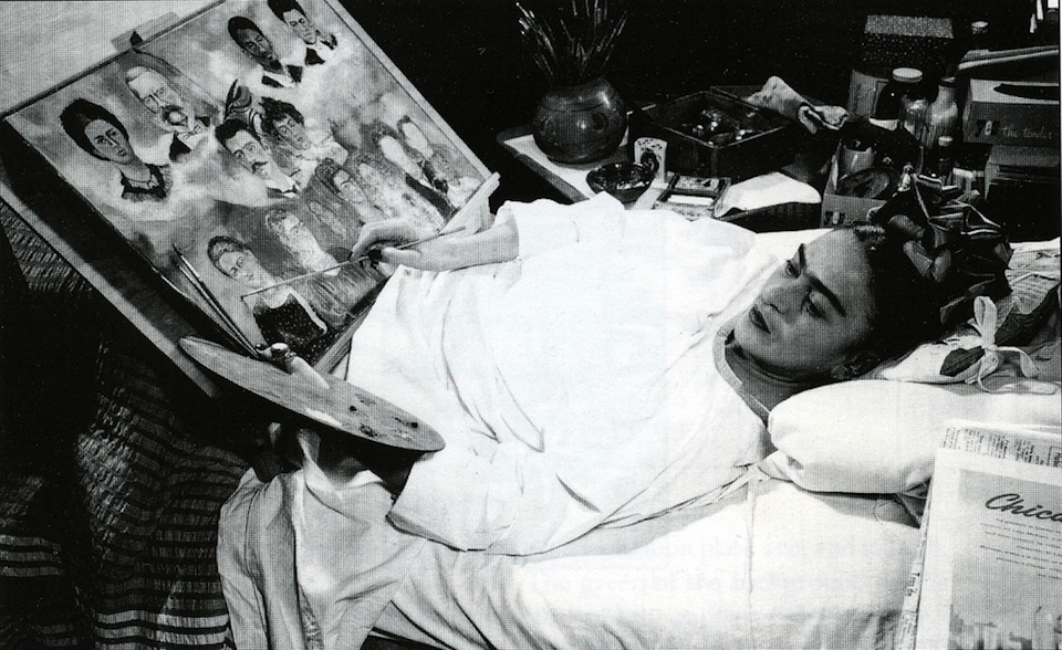 Frida Kahlo, painting in bed
