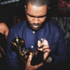 Frank Ocean holds one of his two GRAMMYs